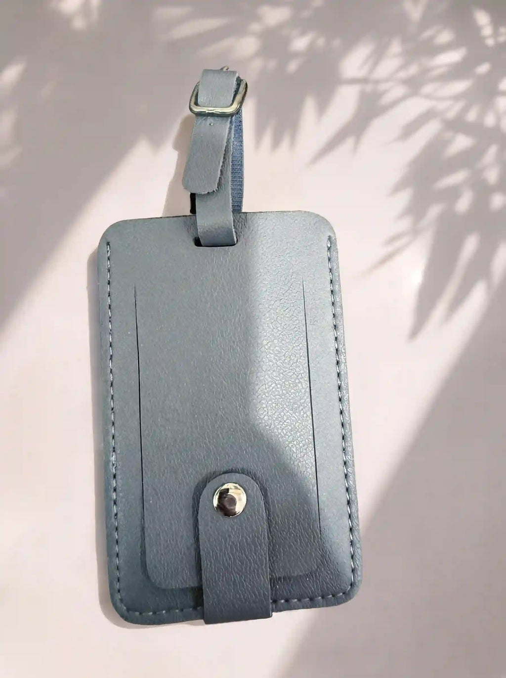 MOCAN grey leather luggage tag