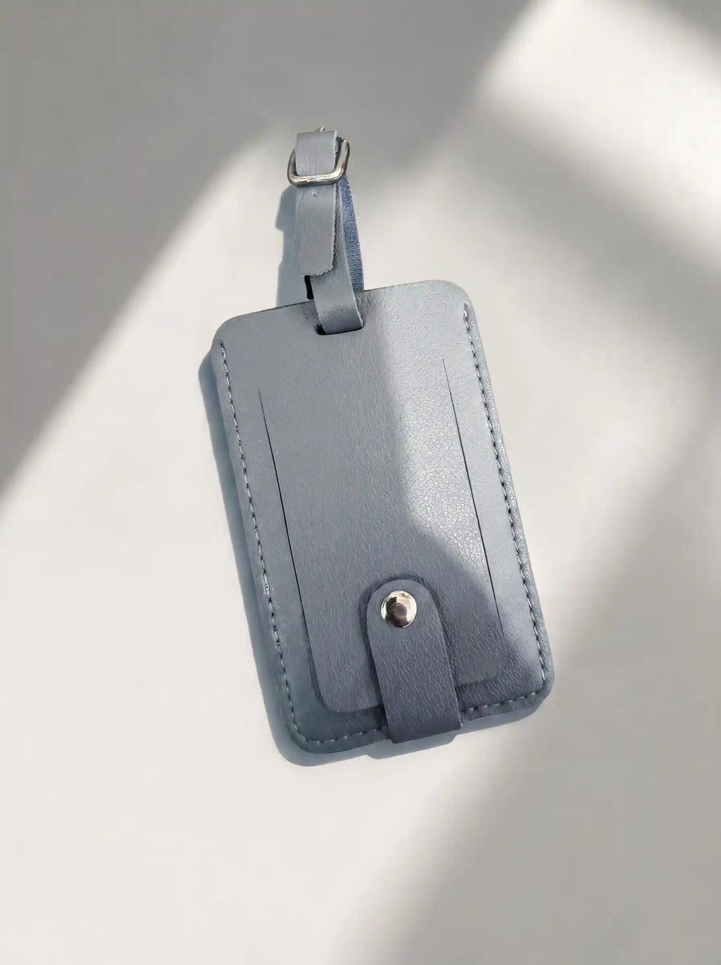 MOCAN grey leather luggage tag