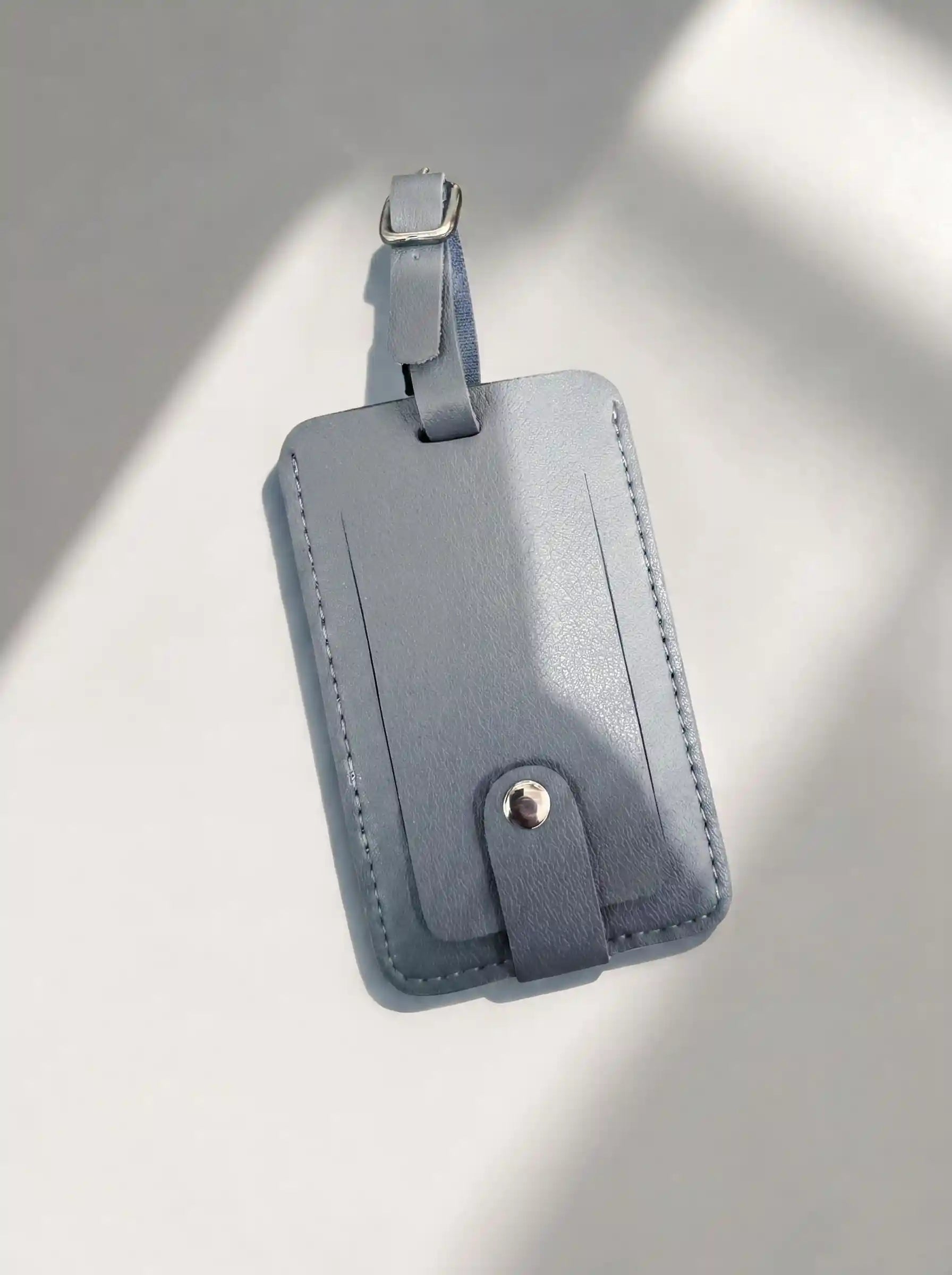 MOCAN grey leather luggage tag