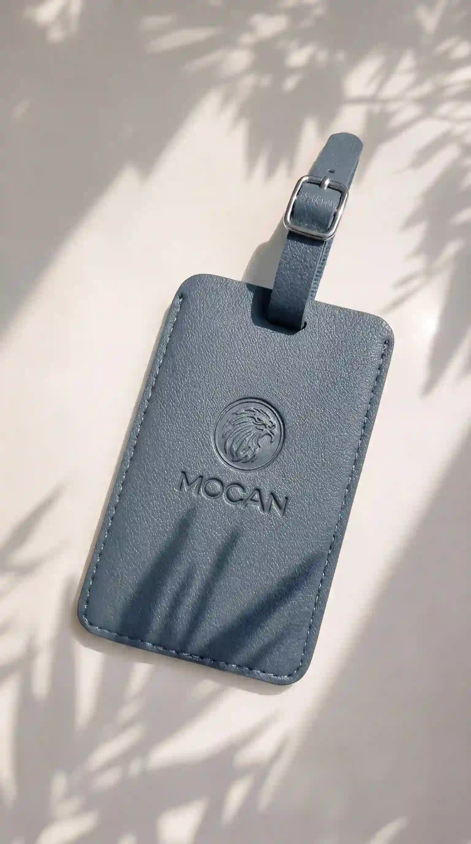 MOCAN grey leather luggage tag