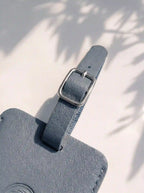 MOCAN grey leather luggage tag