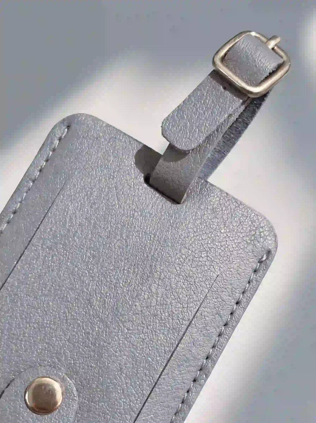 MOCAN grey leather luggage tag