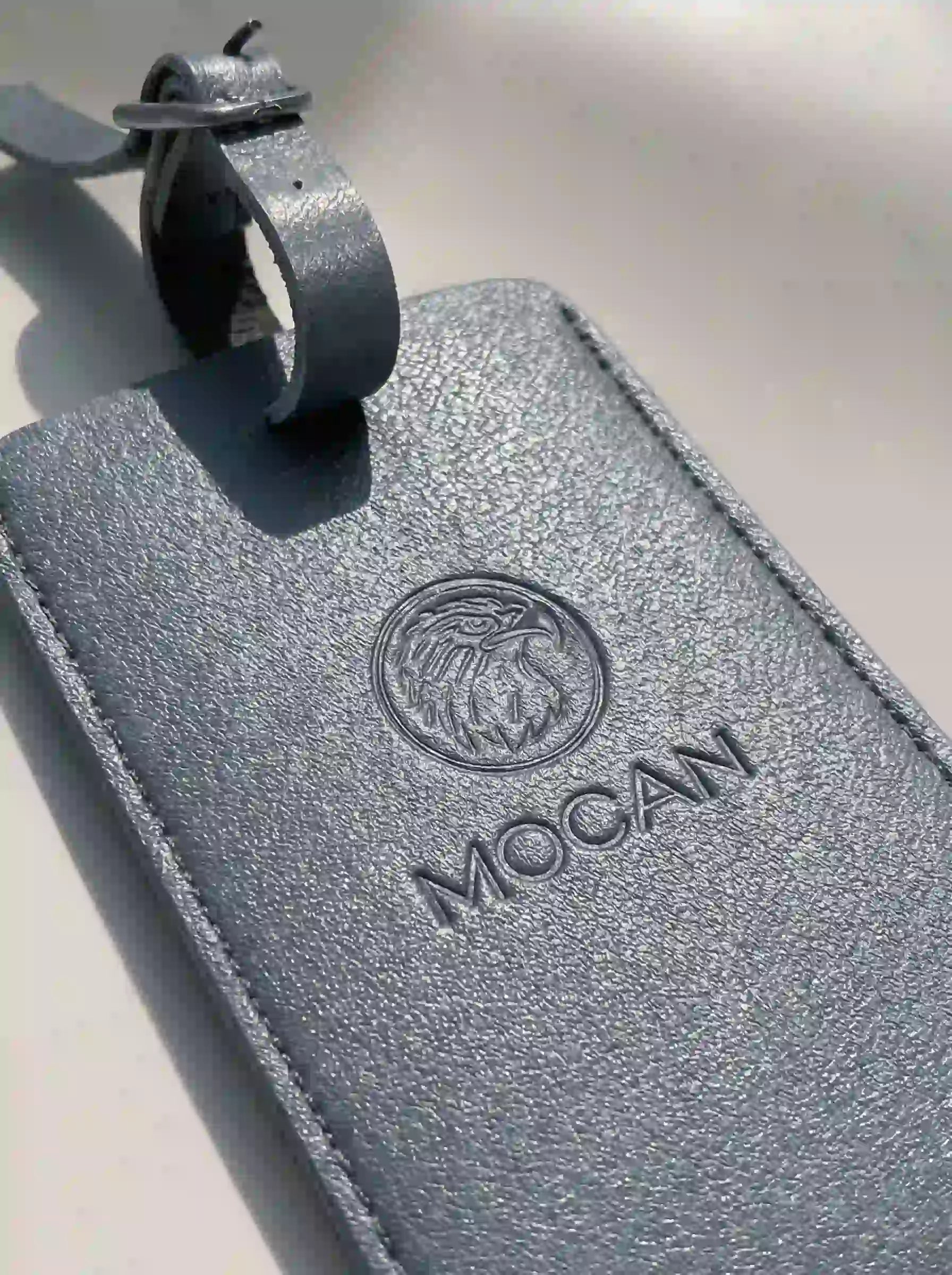 MOCAN grey leather luggage tag